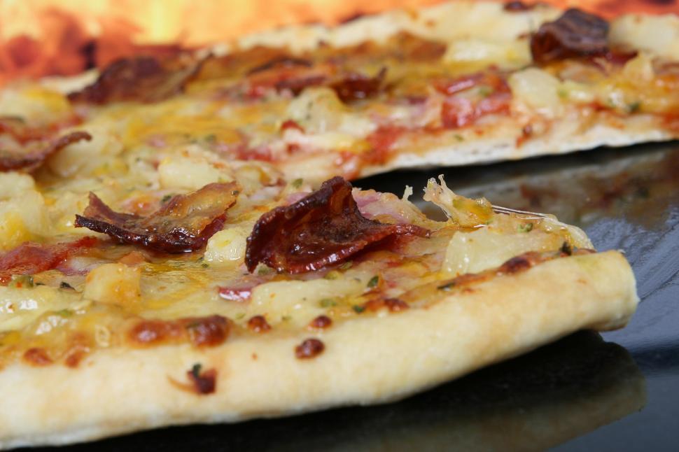 Free Image of Close Up of a Pizza on a Table 