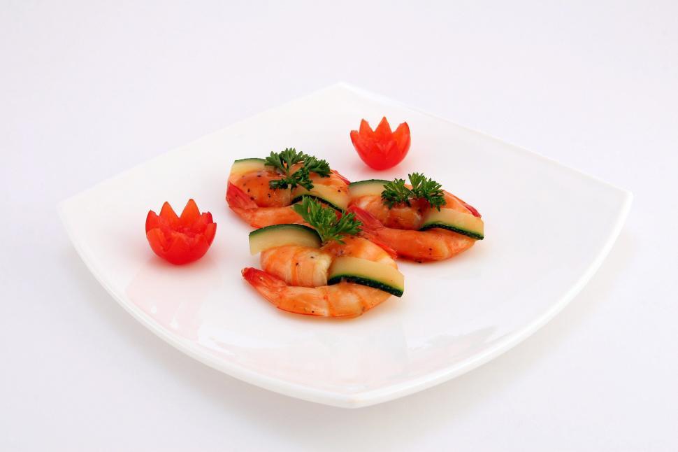 Free Image of White Plate Topped With Shrimp and Veggies 