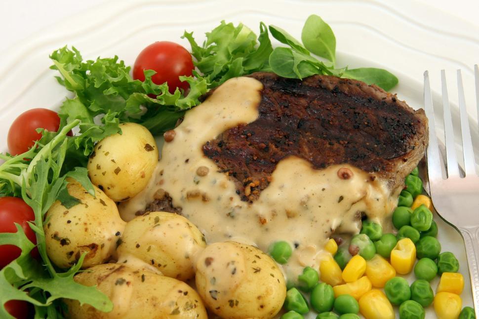 Free Image of White Plate Topped With Meat and Vegetables 