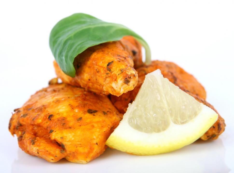 Free Image of Pile of Fried Food With Lemon Slice 