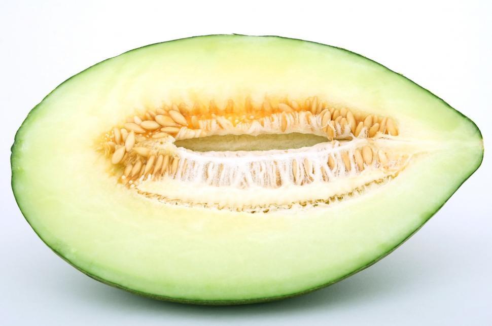Free Image of Half Avocado on White Background 
