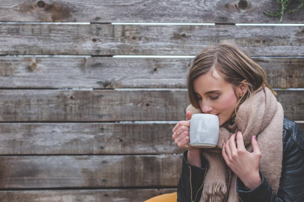 Free Image of Pretty Woman Sipping Coffee 