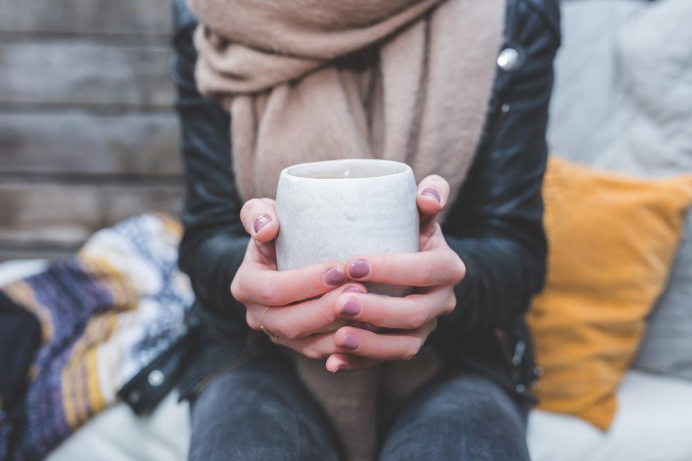Free Image of Woman Holding Coffee Mug 