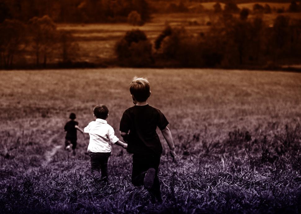 Free Image of Boys Running Outdoors 