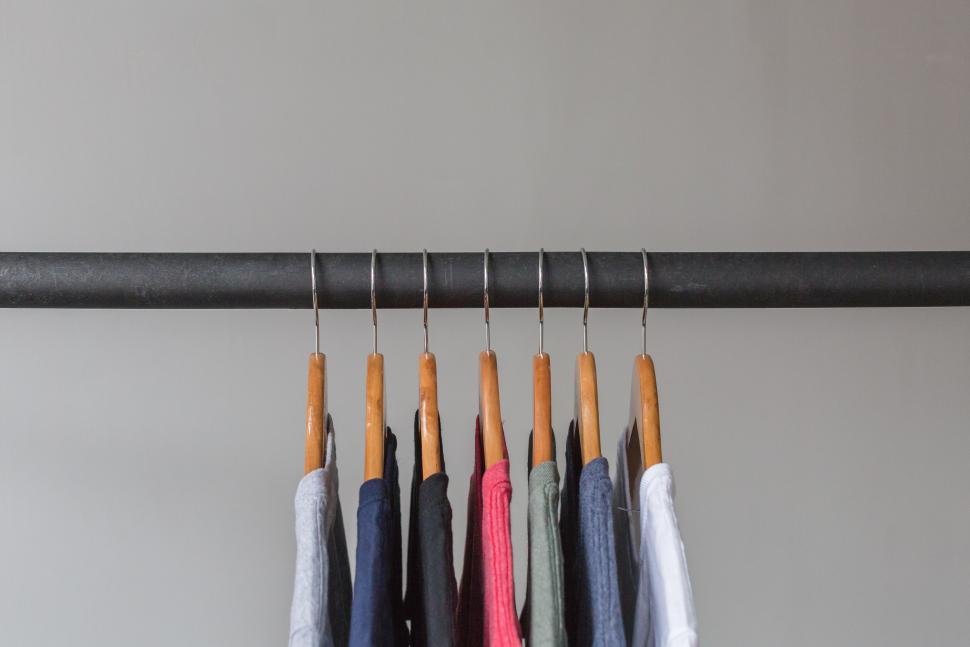 Free Image of T Shirts Hanging On Rack 