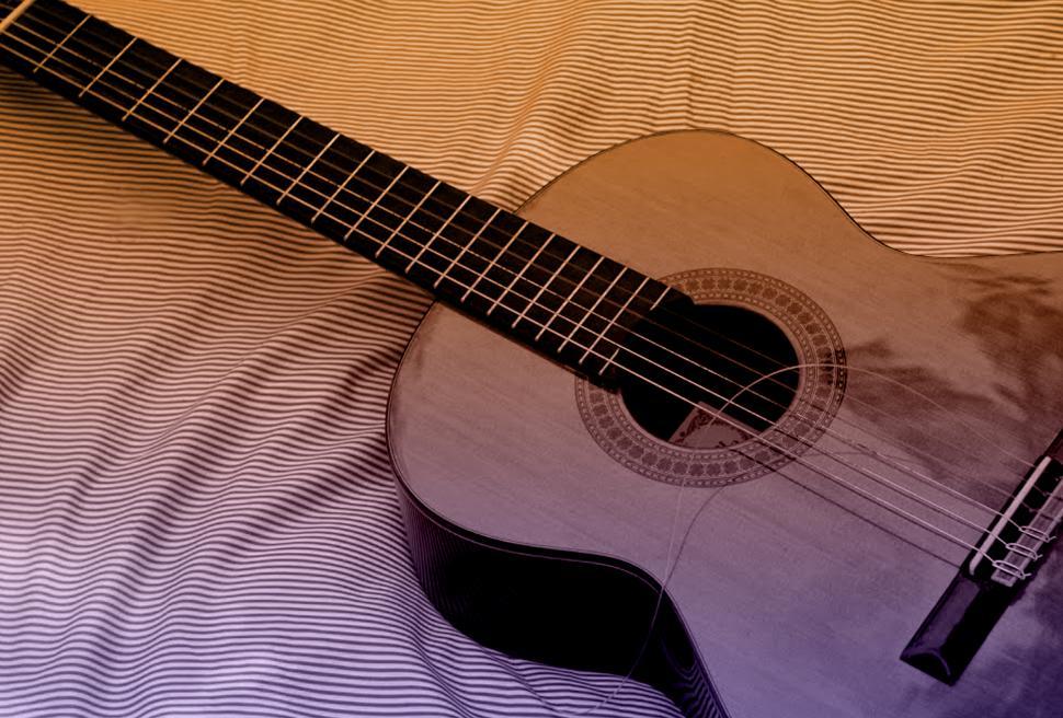 Free Image of Classic Acoustic Guitar with Broken String 