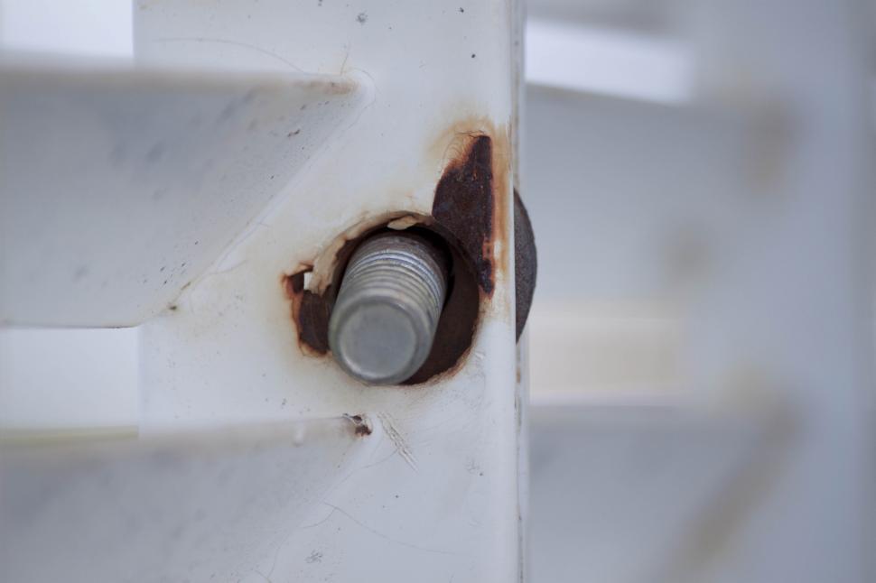 Free Image of Loose screw in rusty hole 