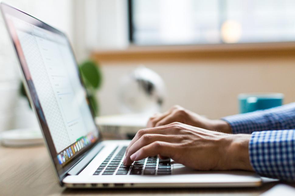 Free Image of Hands Typing On Laptop 