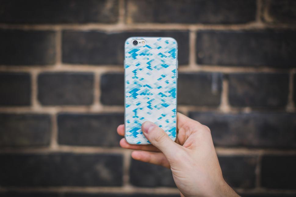 Free Image of Holding iPhone 6 Plus 