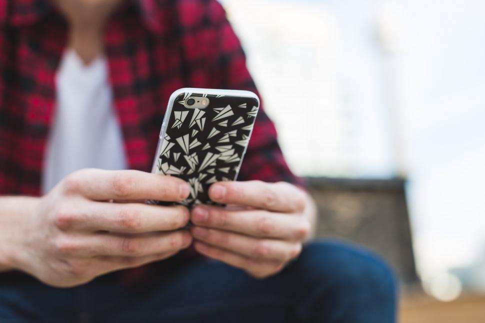 Free Image of Man Texting iPhone 