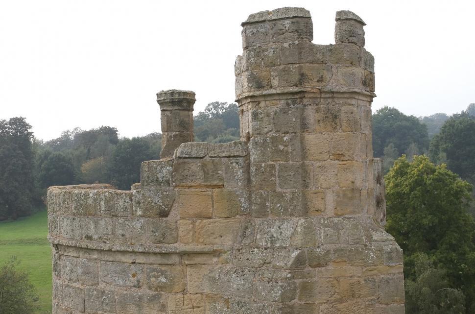 Free Image of Stone Castle With Clock on Side 