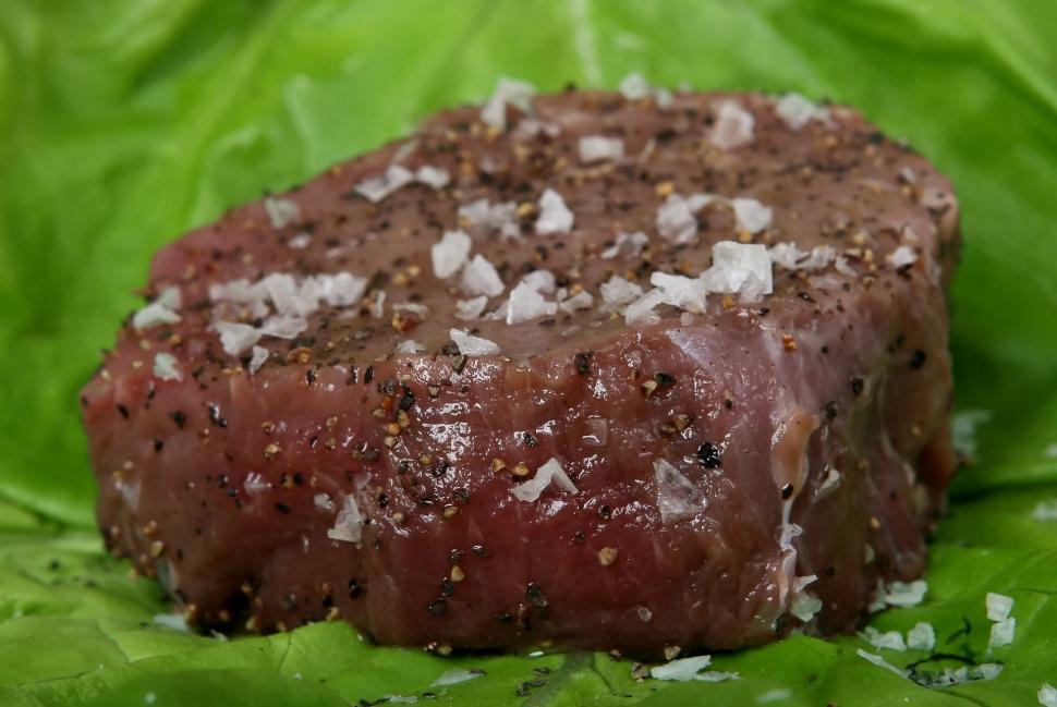 Free Image of Piece of Food on Leafy Surface Close Up 