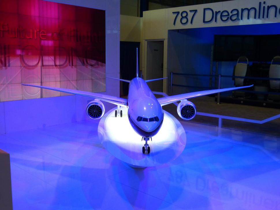 Free Image of Large Jetliner on Blue Floor 