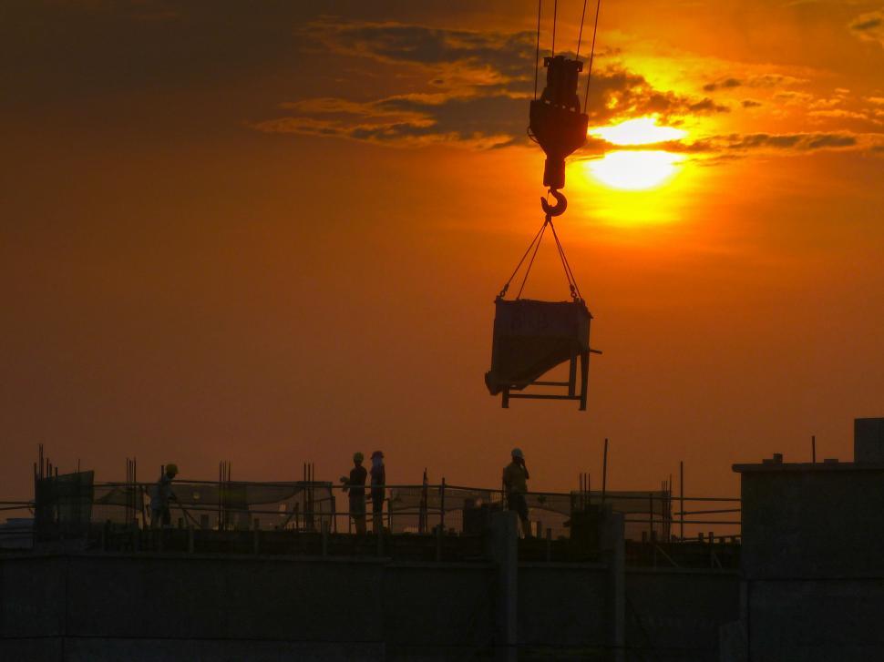 Free Image of Crane Lifting Container Into the Air 