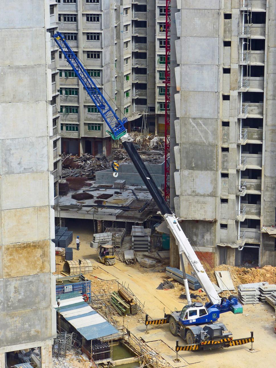 Free Image of Crane on Top of Building 