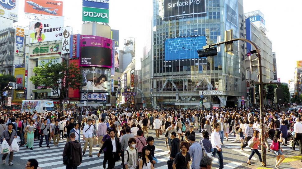 Free Image of Large Group of People Crossing a Street 