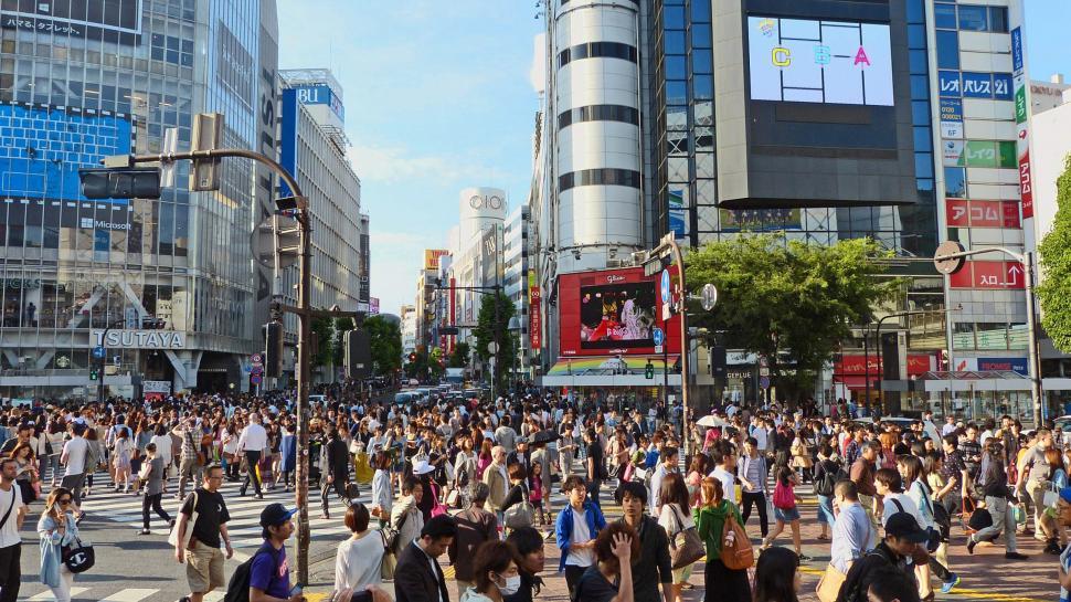 Free Image of Large Group of People Crossing Street 