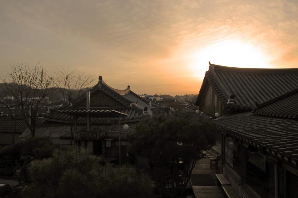 Free Image of Sun Setting Over Village 