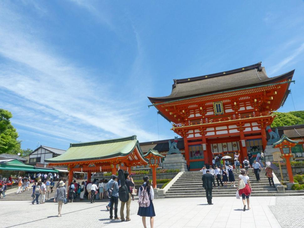 Free Image of Group of People Standing in Front of a Building 