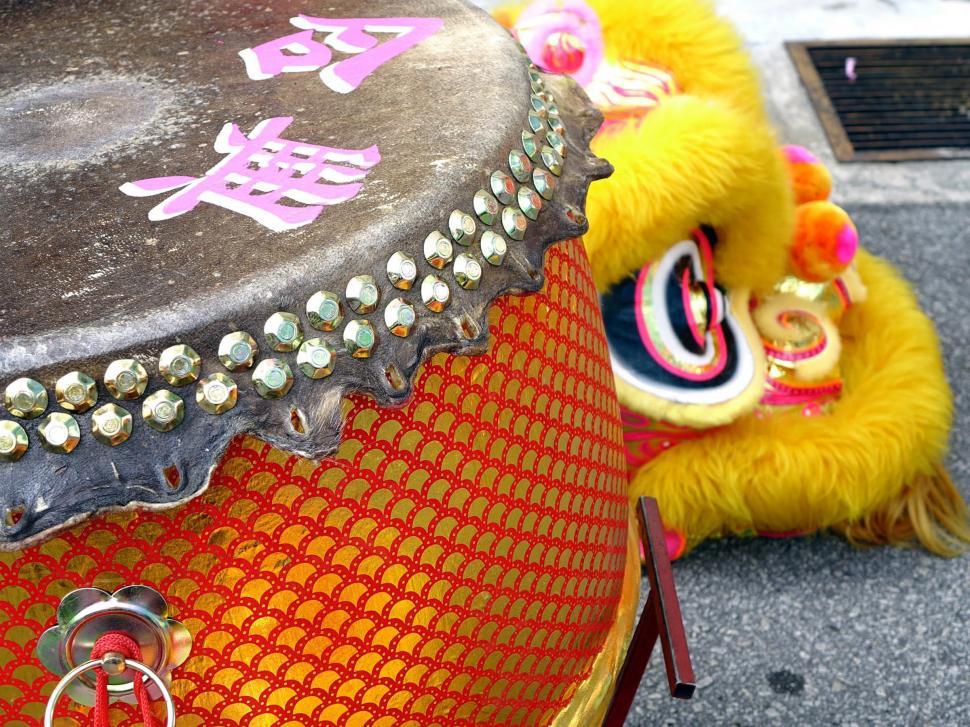 Free Image of Yellow Lion Head on Red Chair 