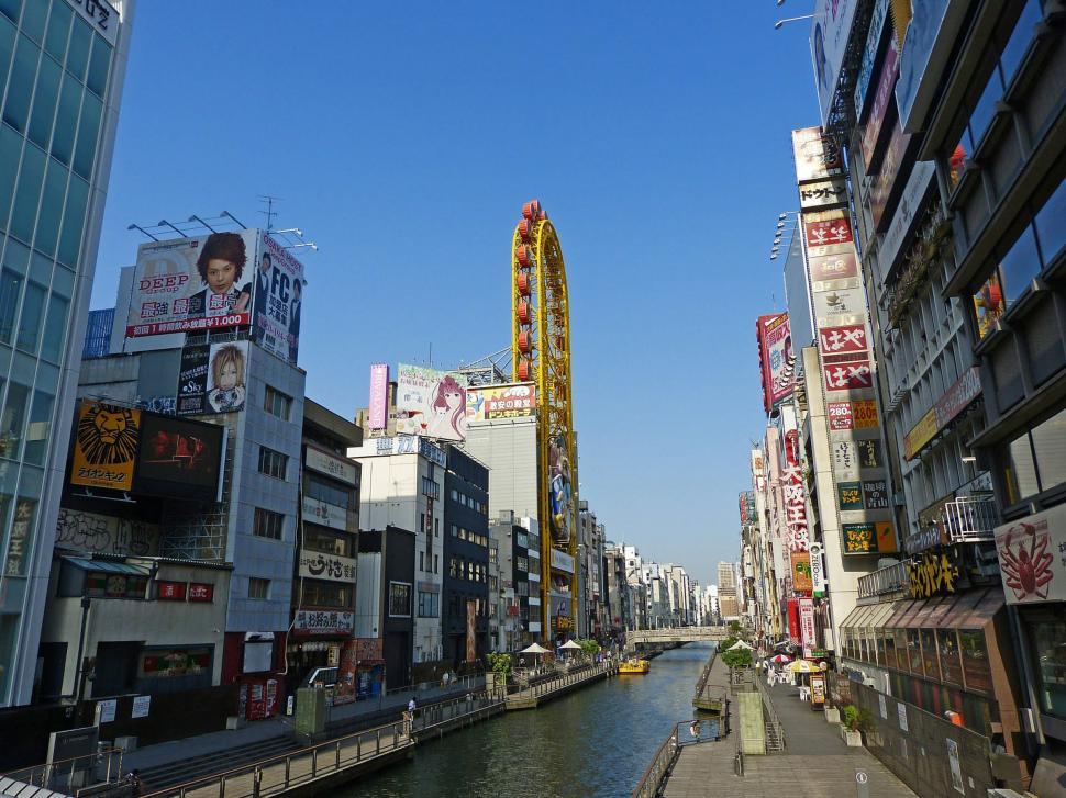 Free Image of River Flowing Through Urban Area With Tall Buildings 