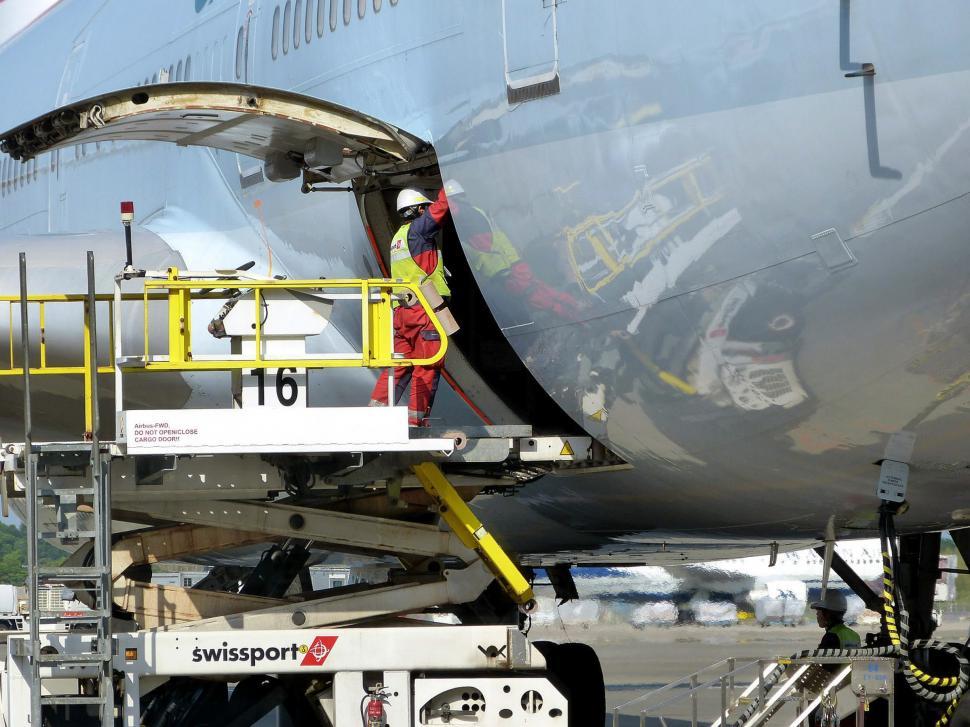 Free Image of Large Jetliner Parked on Airport Tarmac 