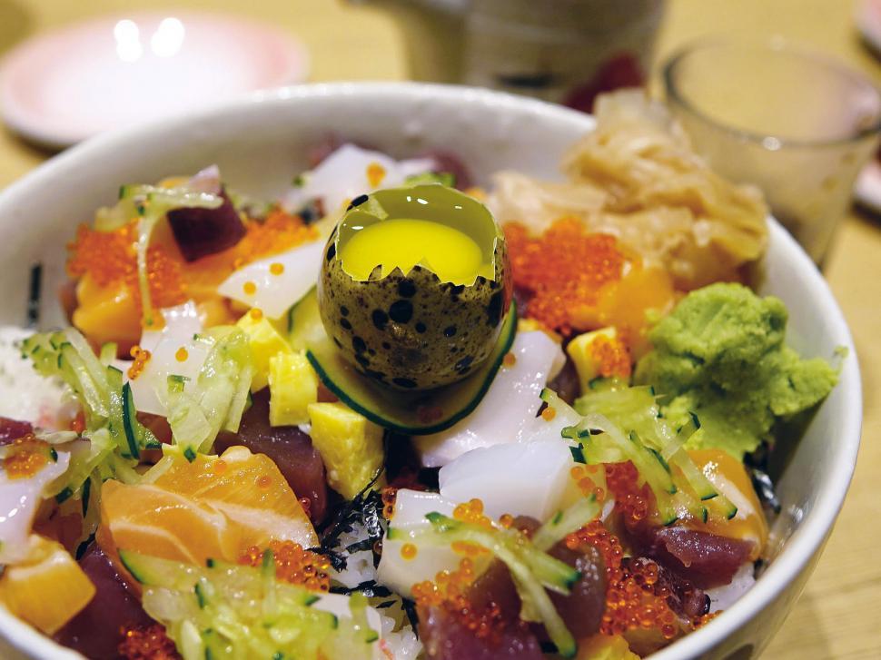 Free Image of White Bowl Overflowing With Various Foods 