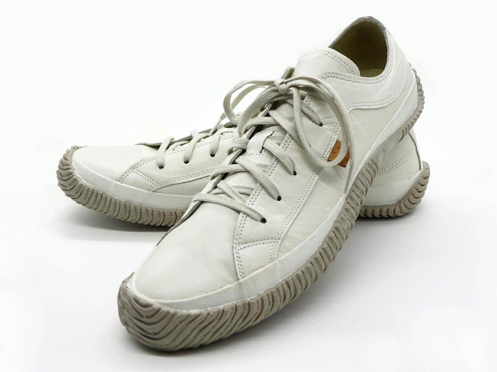 Free Image of A Pair of White Sneakers on White Background 