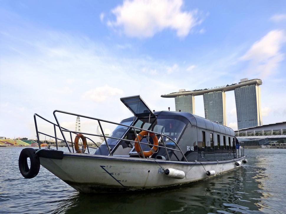 Free Image of Boat Floating on Body of Water 