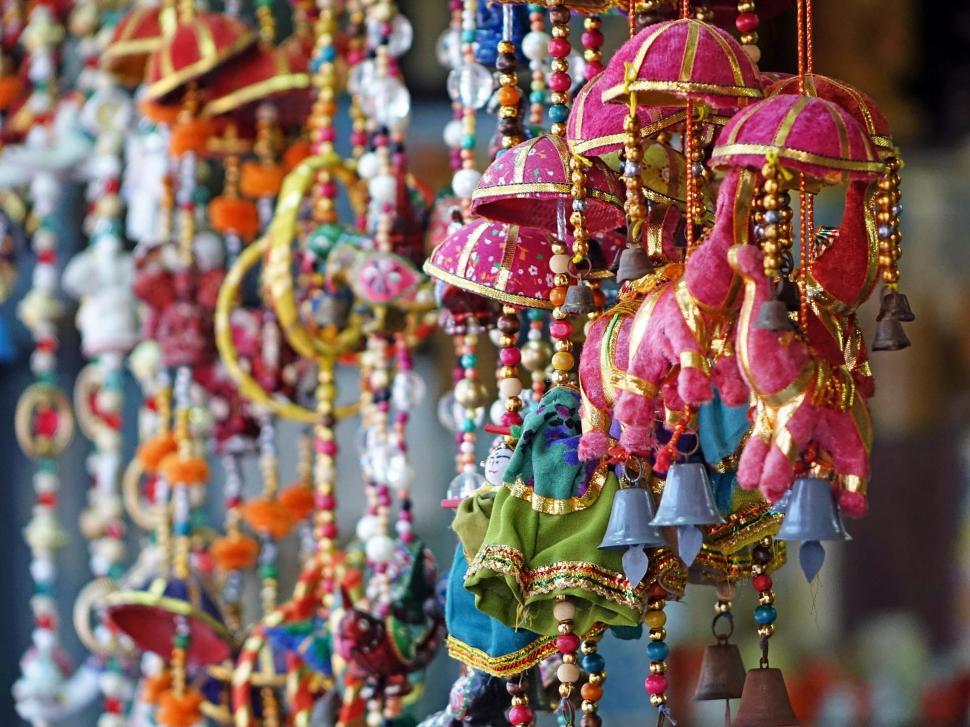 Free Image of Colorful Necklaces Hanging on Wall 