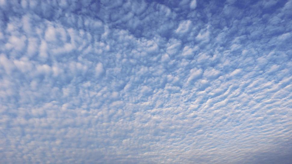 Free Image of A Plane Flying Among Clouds 