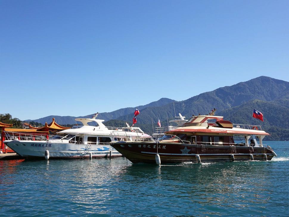 Free Image of Boats Sailing on a Waterbody 