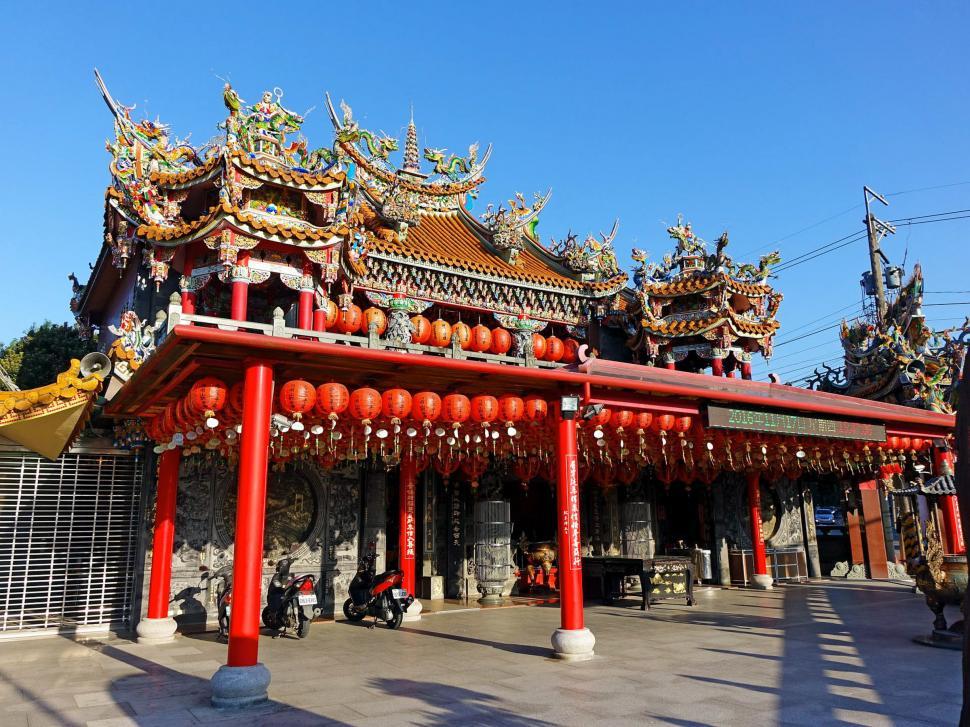 Free Image of Red and White Building Adorned With Decorations 