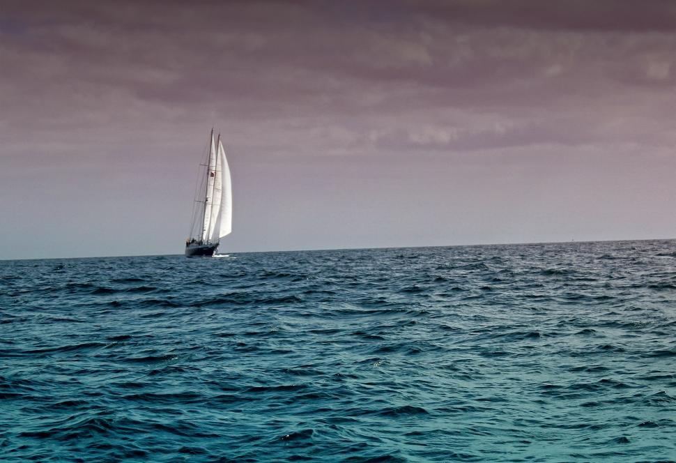 Free Image of Sail Boat Under Dark Skies 