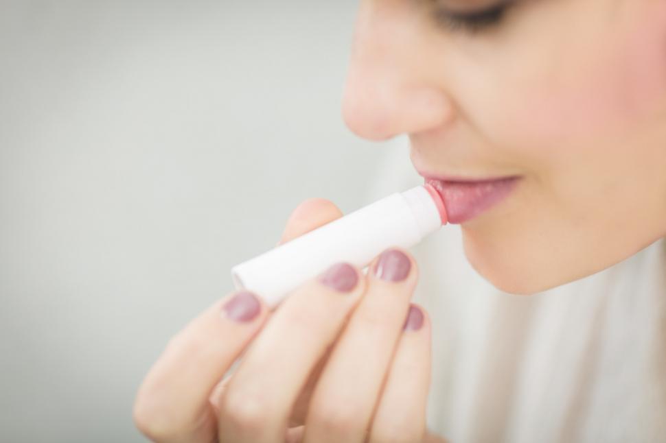 Free Image of Applying Lip Balm 