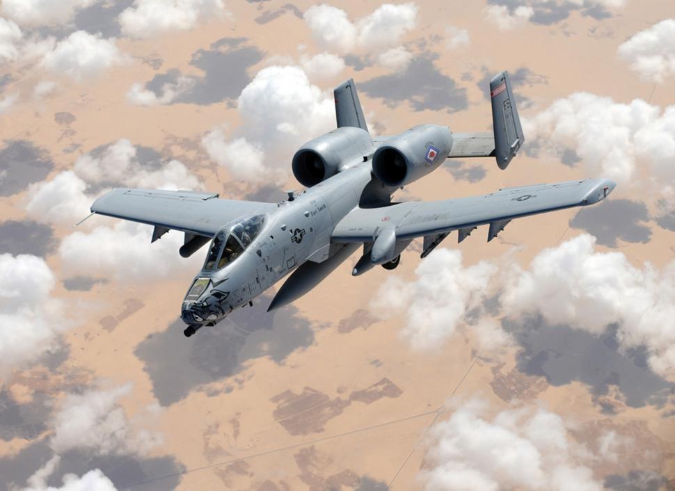Free Image of Large Military Plane Flying Through the Sky 