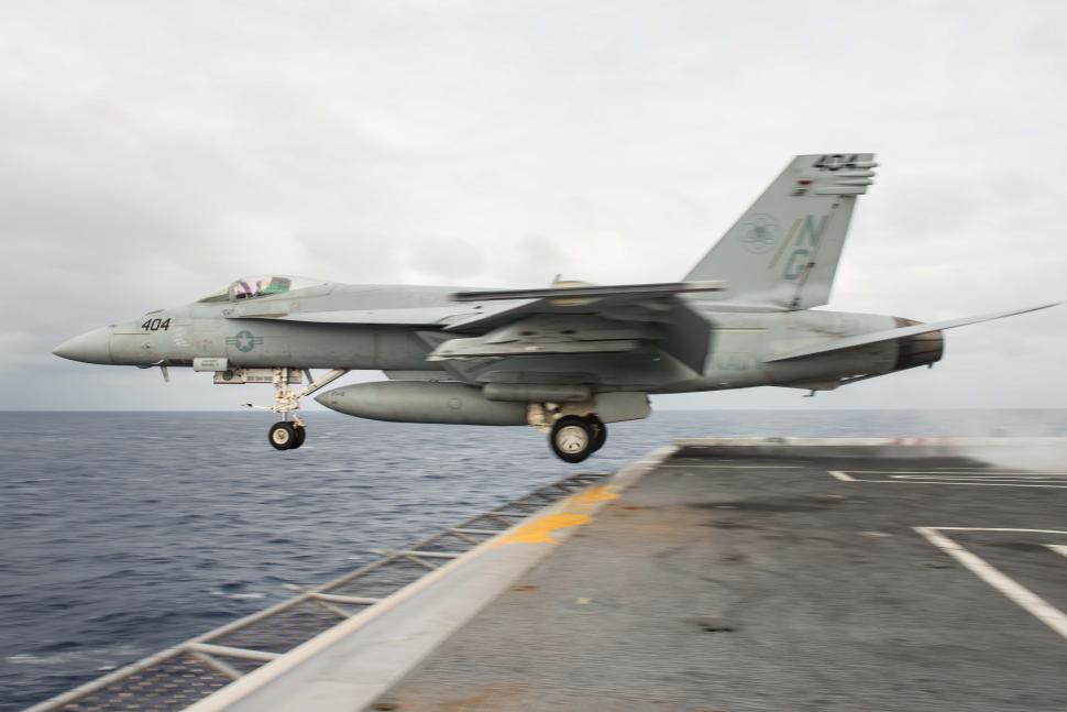 Free Image of Fighter Jet Taking Off From Aircraft Carrier 
