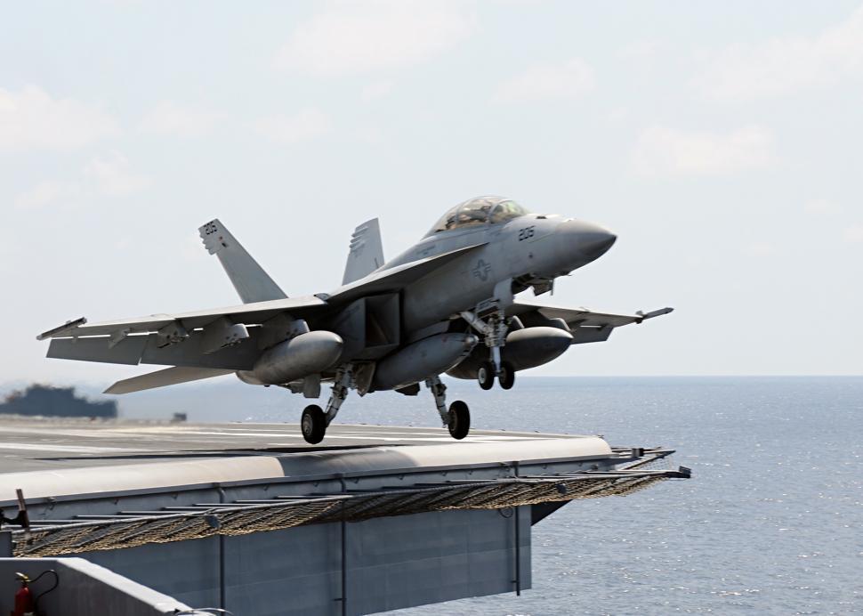 Free Image of Fighter Jet Taking Off From Aircraft Carrier 