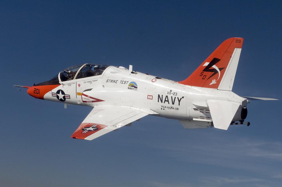 Free Image of Fighter Jet Flying Through a Blue Sky 