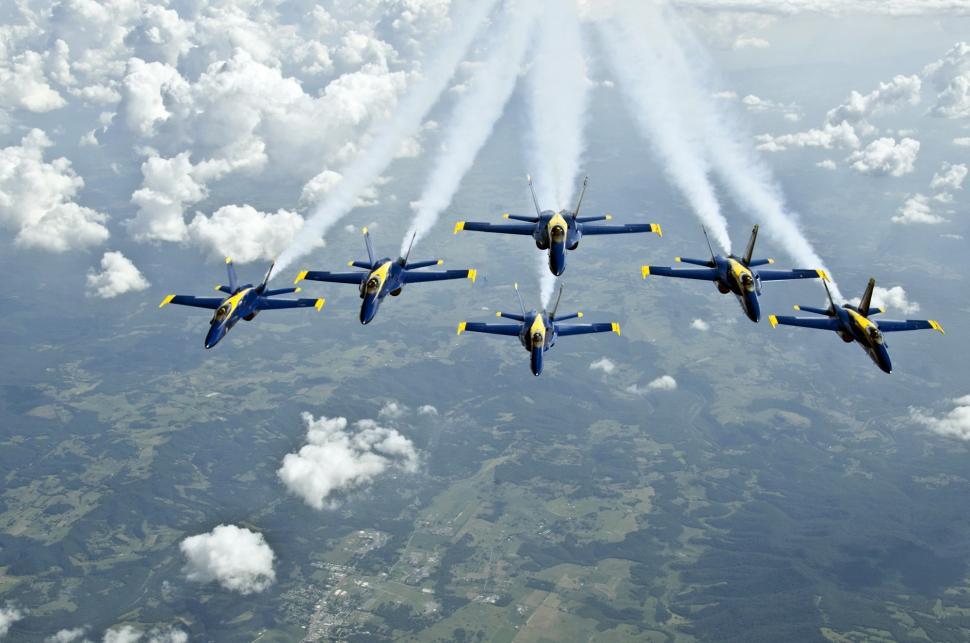 Free Image of Group of Fighter Jets Flying Through the Sky 