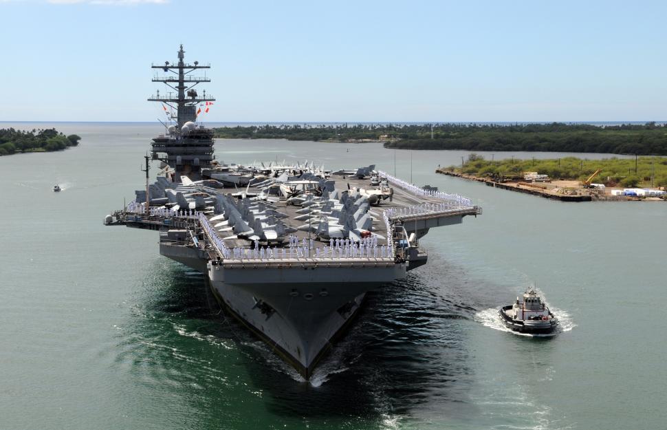 Free Image of Large Ship Sailing in the Middle of a Water Body 