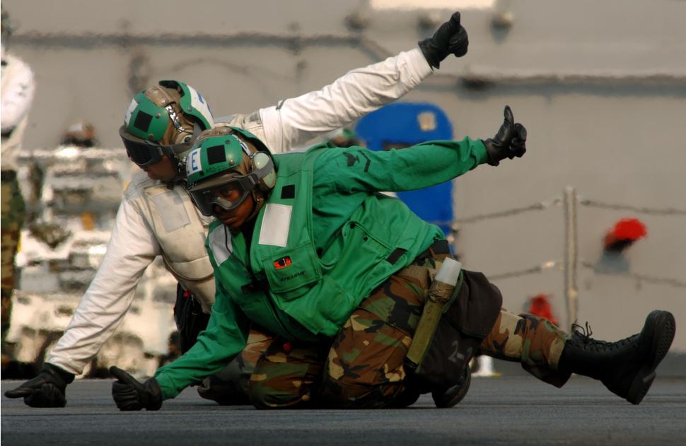 Free Image of Two People Lying on the Ground 