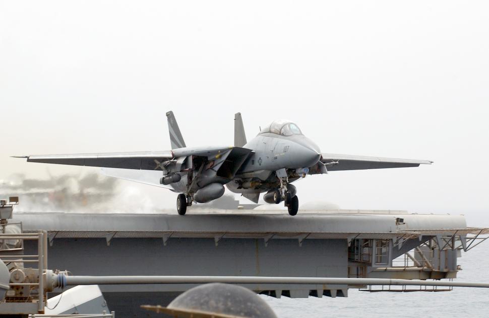 Free Image of Fighter Jet Taking Off From Aircraft Carrier 