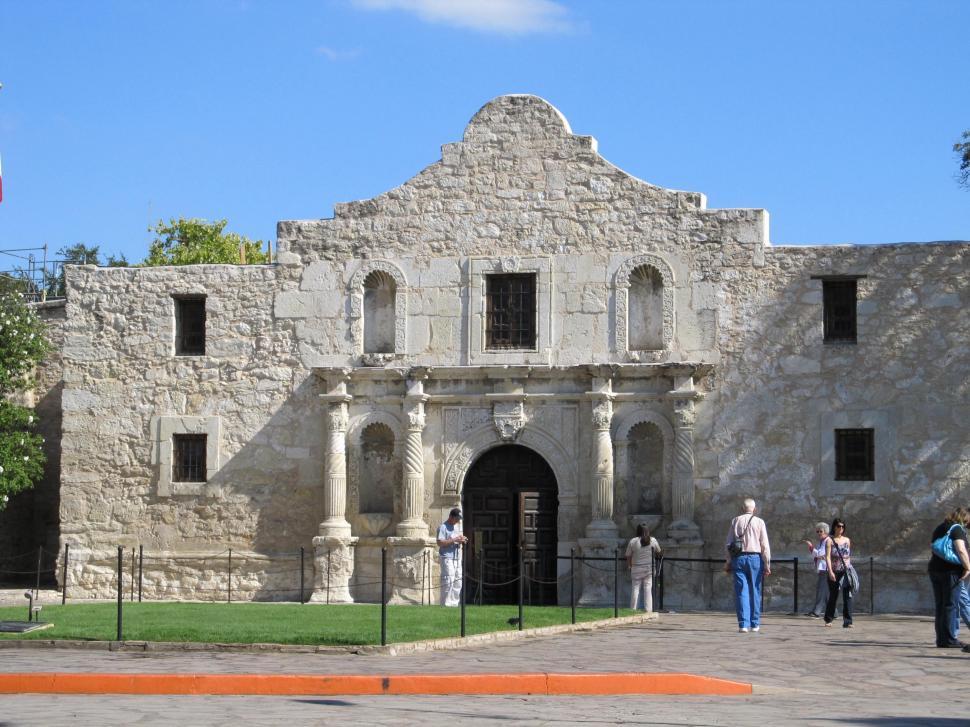 Free Image of Group of People Standing in Front of Building 