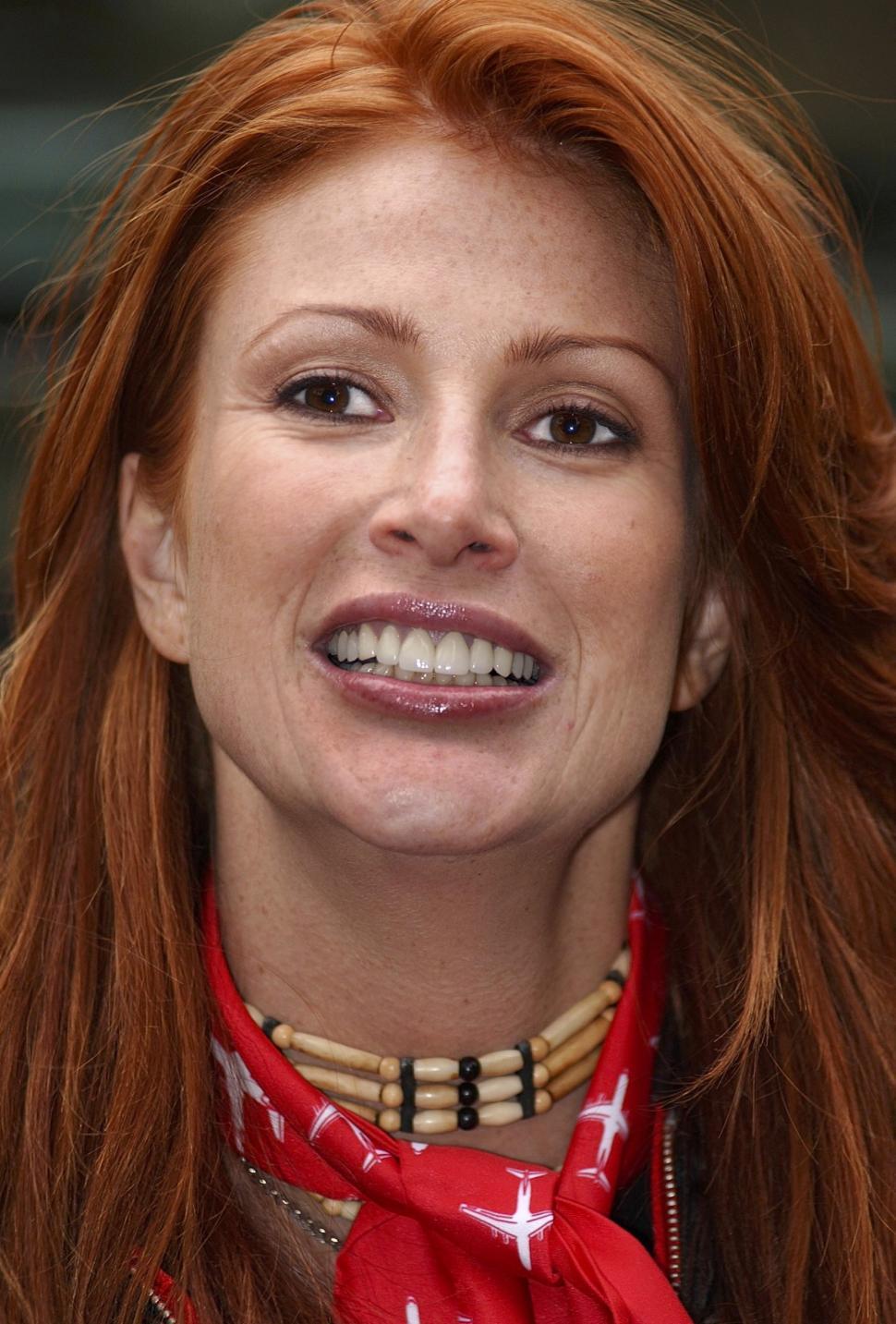 Free Image of Person Wearing Red Scarf Close Up 