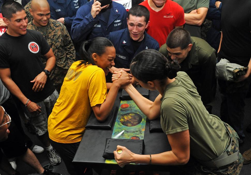 Free Image of Group of People Standing Around a Table 