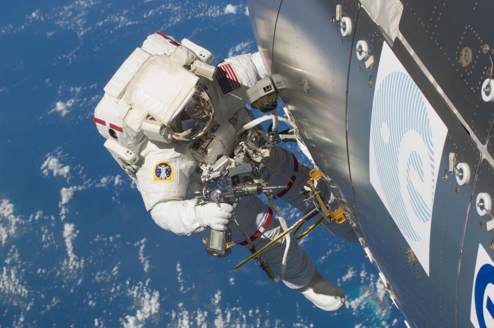 Free Image of Man in Spacesuit Floating in Air 