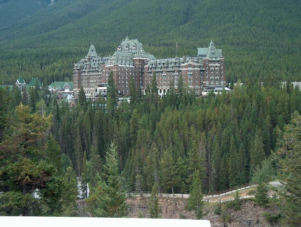 Free Image of Large Building Standing in Forest 