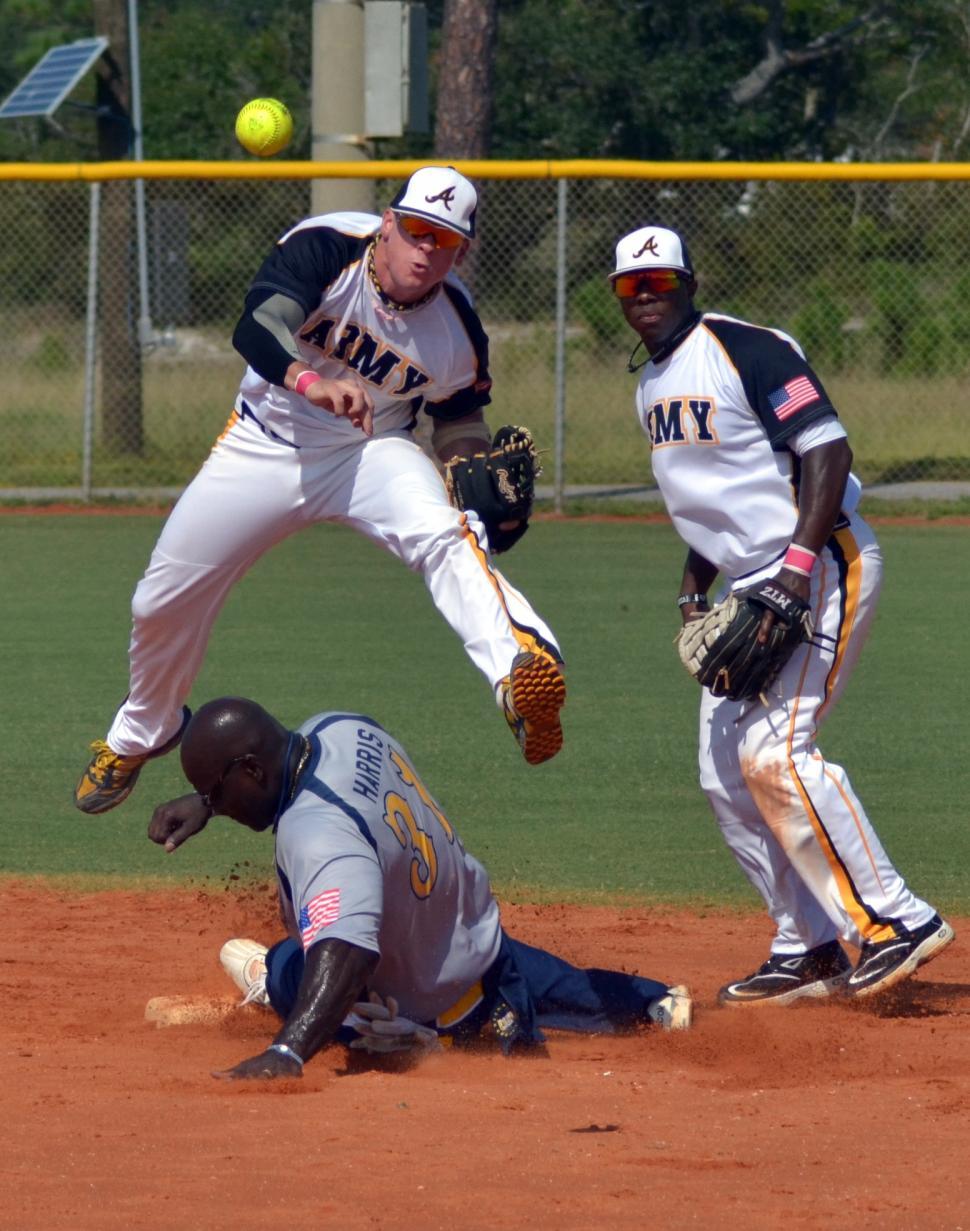 Free Image of Baseball Player Sliding Into Base During Game 