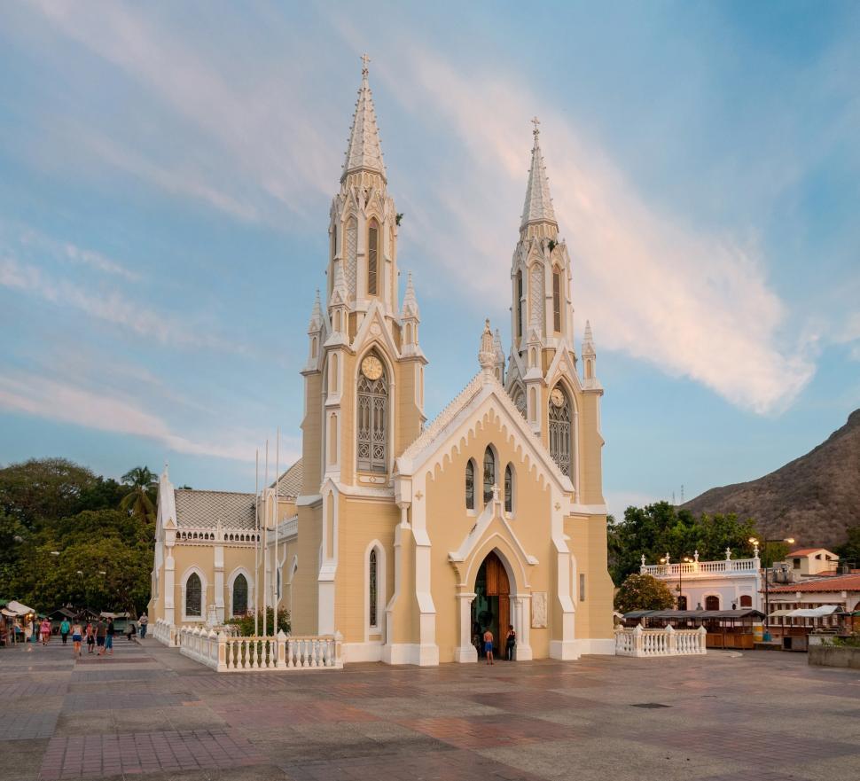 Free Image of Large Church With Two Towers Against Sky Background 